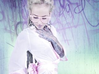 Explicit Tattood Beauty With Glasses And Buttplug Screws A Tattooed Penis, Double Penetration, Facial